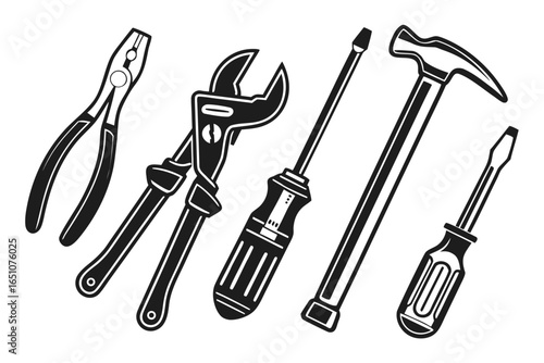 Collection of hand tools including a hammer, wrench, pliers, and screwdrivers isolated on white background
