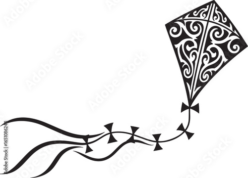 Ornamental kite soars gracefully, a decorative emblem of soaring