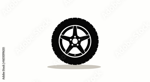 A black car tire with a five-spoke silver rim, isolated on a white background.