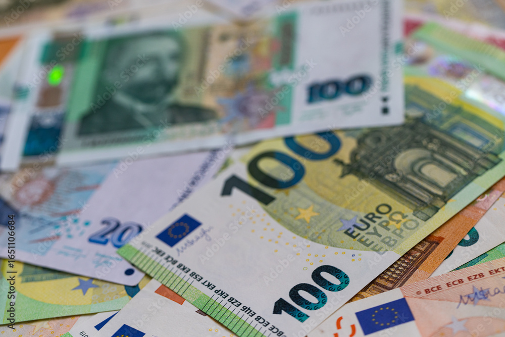 Obraz premium A Flat Lay Composition of Bulgarian Lev and Euro Banknotes