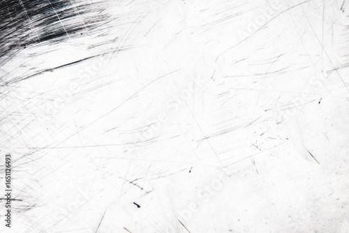 金属やフィルムを思わせる繊細な傷模様の背景素材
