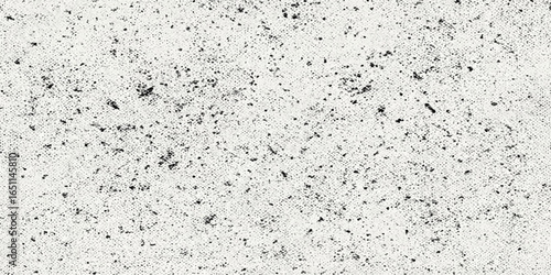 Closeup on a textured gray concrete wall with a water-damaged old paper pattern