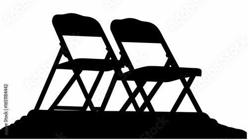 Silhouette depiction of two folding chairs placed side by side on a slightly elevated platform area
