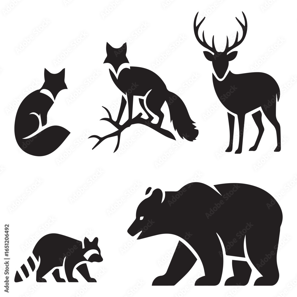 Obraz premium Silhouettes of forest animals including deer fox raccoon and bear