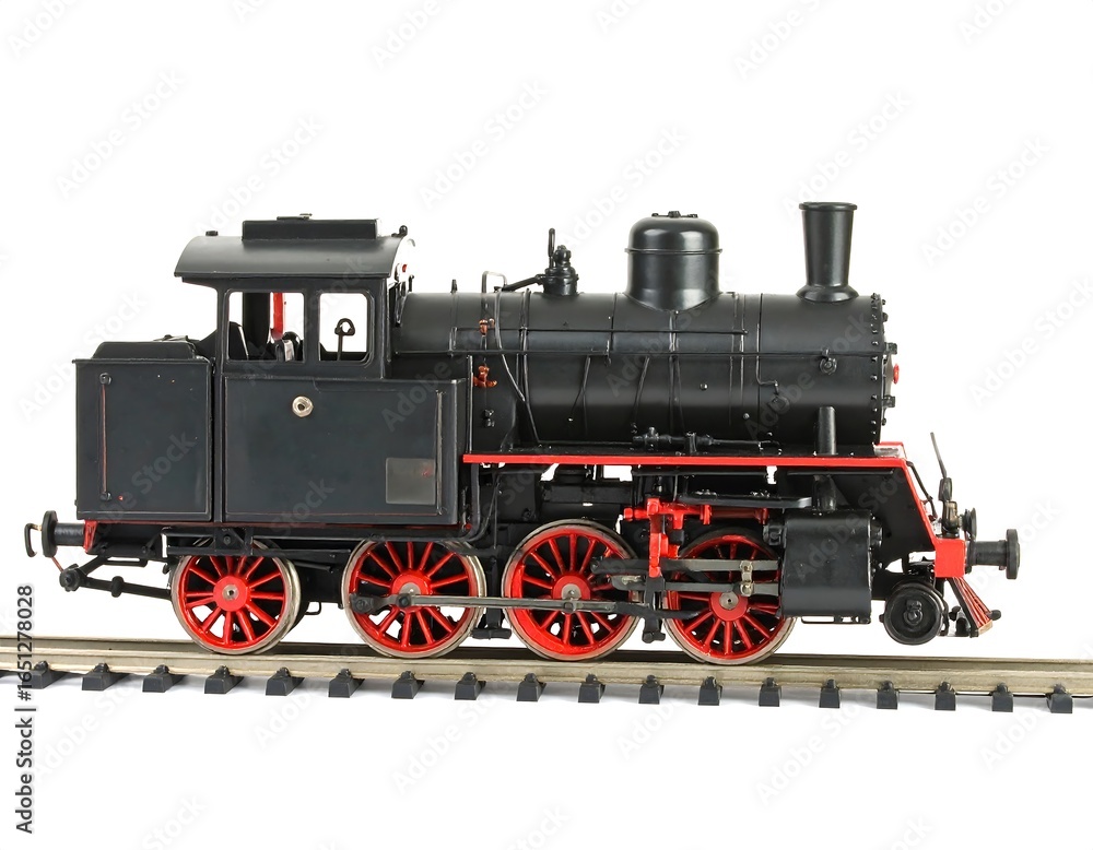 Fototapeta premium Detailed Black Steam Locomotive Model on Track.