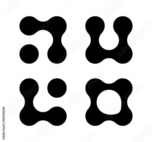 Four Distinct Metamorphic Patterns Each Displaying Variations of Connected Blobs and Unique Negative Space Designs On White
