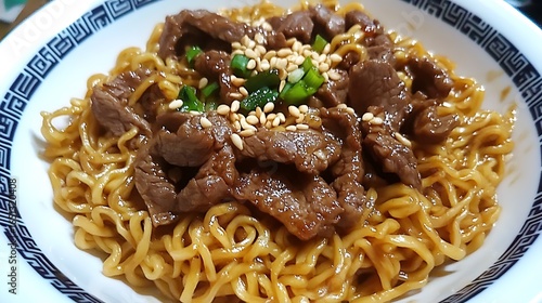 Egg noodles stir-fried with beef and soy sauce