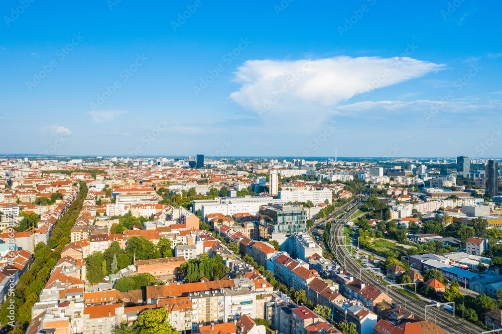 Naklejka premium Panorama of Zagreb, Croatia. Aerial view of green wave and western side of city center.
