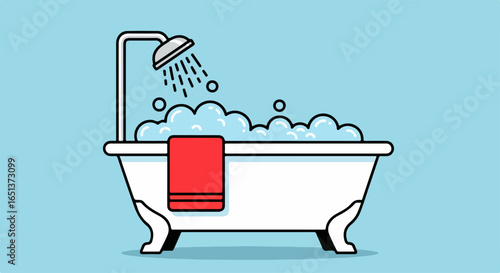 Classic White Bathtub Filled With Bubbles and Red Towel.