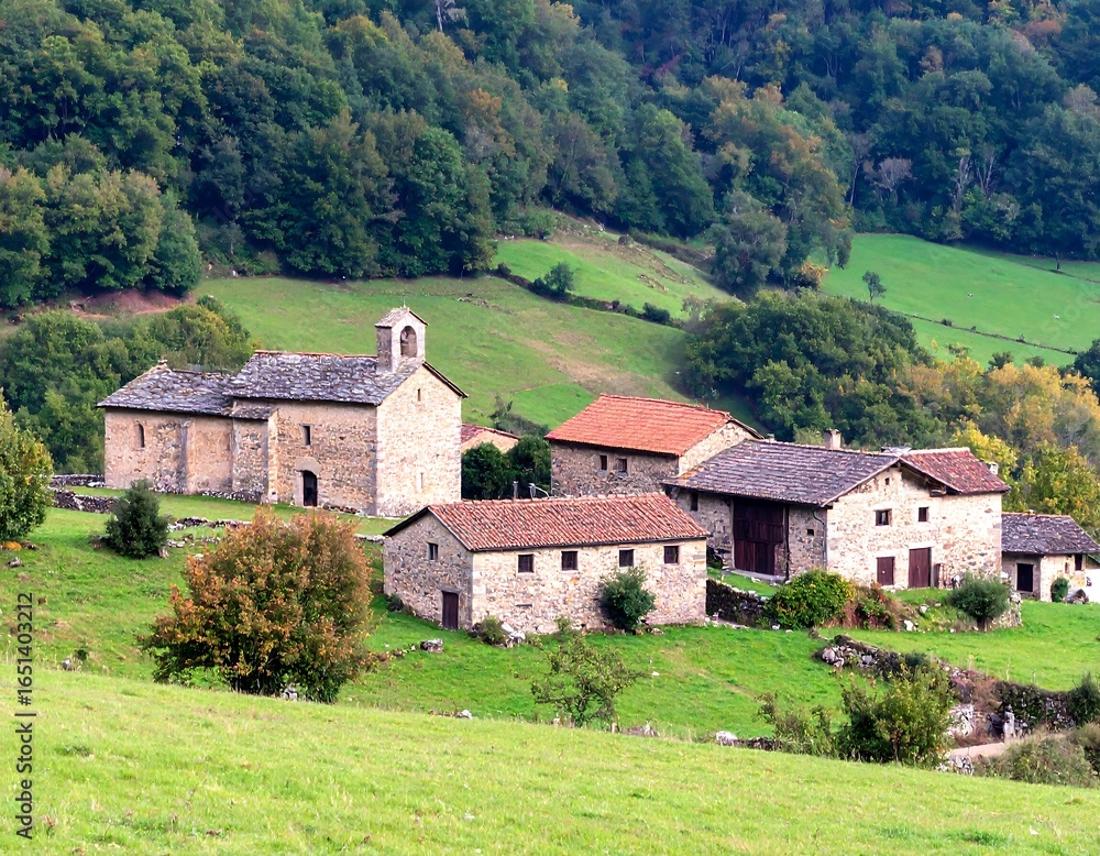 Fototapeta premium Rustic village nestled in a valley
