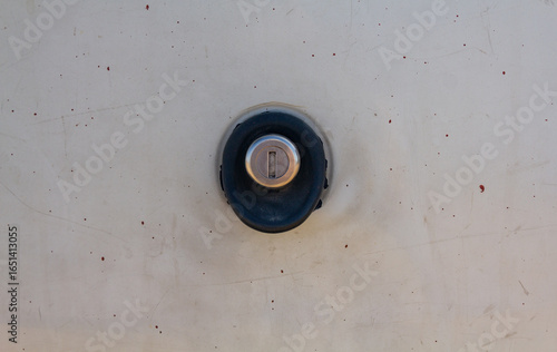 a car's rear door lock handle