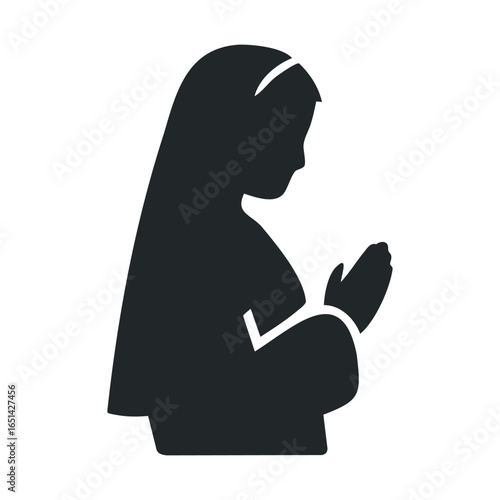 Silhouette of praying female figure in reverence pose