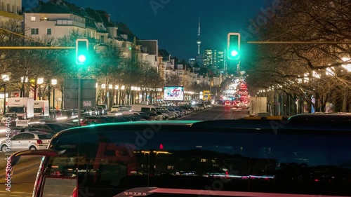 Night scene of a street in berlin, germany, with traffic and city lights