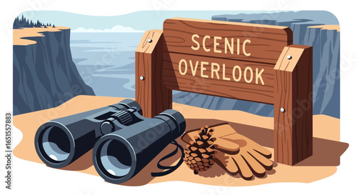 Binoculars, gloves, and a pinecone rest near a 'Scenic Overlook' sign at a cliffside viewpoint.
