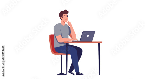 Thoughtful young man in a grey t-shirt sitting at a desk, thinking while working on his laptop computer.