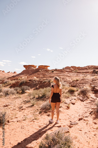 Young Woman Walking in the Desert