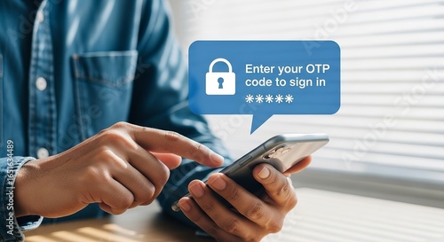 Wallpaper Mural Man entering one time password code on smartphone for secure online transaction Torontodigital.ca