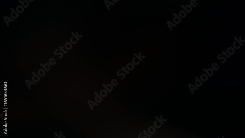 Raw anamorphic lens flare overlay from vintage glass in cinematic resolution – Organic light leaks captured for editing use.