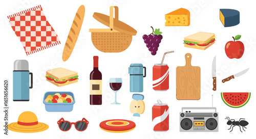A delightful picnic spread featuring food basket and various items laid out