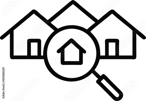 A magnifying glass focusing on a house amidst a backdrop of residential buildings and mountains