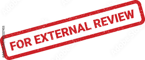 Red rubber stamp with text FOR EXTERNAL REVIEW tilted on a