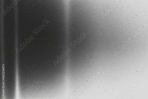 Black and white spray paint gradient texture with grainy abstract background