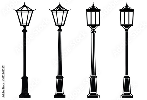 Four classic black street lamps arranged in a row against a white background