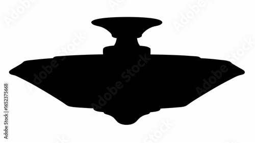 Silhouette of a decorative ceiling light fixture with a wide shade and ornate central mounting piece