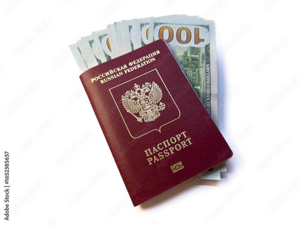 Russian passport and hundred dollar bills. Entry tax to the USA, visa fee, visa tax, deposit of money in the USA upon entry. immigration emigration visa us, visa USA, copy space, flat lay, top view. H Russian passport and hundred dollar bills. Entry tax to the USA, visa fee, visa tax, deposit of money in the USA upon entry. immigration emigration visa us, visa USA, copy space, flat lay, top view. H