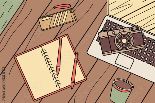 Creative workspace with camera laptop notebook and coffee for photographers and writers on wooden desk