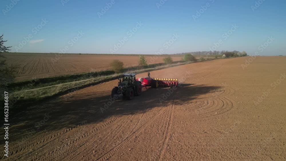 Powerful Tractor Sowing Corn with Precision Planter in Ukraine Powerful Tractor Sowing Corn with Precision Planter in Ukraine