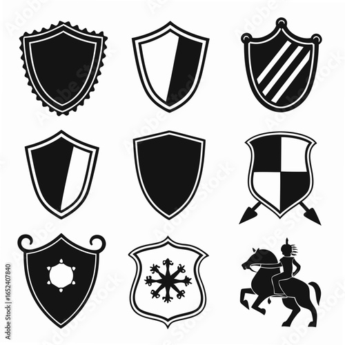 Collection of nine distinct black and white heraldic shields and emblems including a knight on horseback and various decorative shield designs