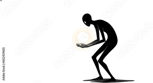 Dark silhouette stands bent holding light orb in hands