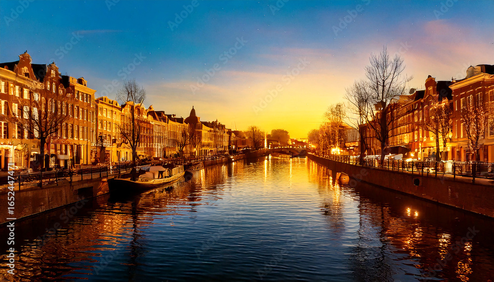 Obraz premium Colorful cityscape at sunset in amsterdam