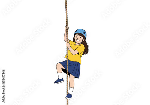 A young girl ascending a thick rope wearing a blue helmet and yellow t-shirt engaged in an outdoor climbing activity