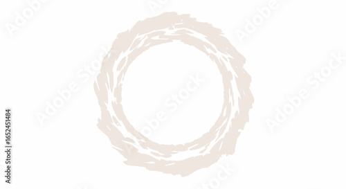 A tan roughlytextured ring with a slightly ragged edge on a plain white background