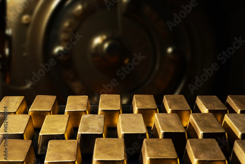 Gold bars in bank vault, national gold reserv holdings concept. Savings and investments, business and finance