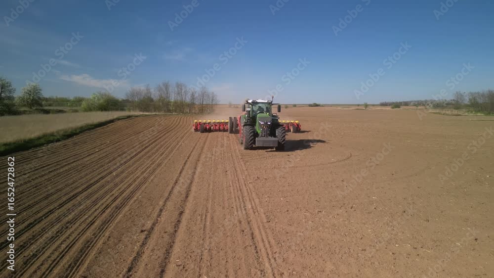Powerful Tractor Sowing Corn with Precision Planter in Ukraine Powerful Tractor Sowing Corn with Precision Planter in Ukraine