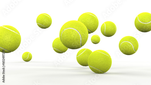 Many falling tennis balls on a white background. 