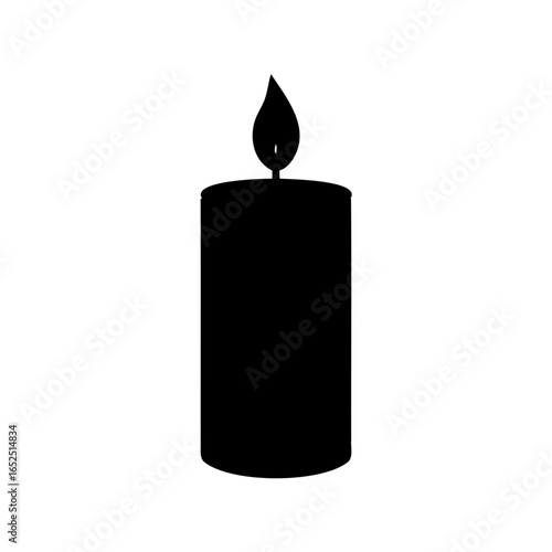 Black silhouette of a burning candle radiating light in the darkness