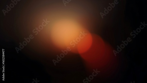 grainy colorful warm orange light leaks on black background with dust texture. abstract damaged scratched retro film analog effect for using over photos as overlay or screen filter