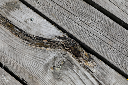 Some of the planks on the jetty are rotting
