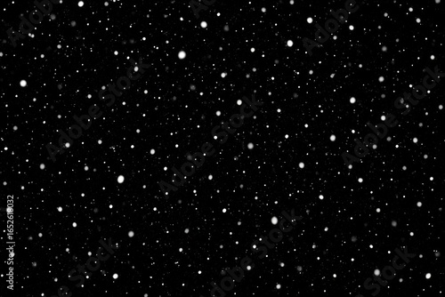Falling Snow Over a Black Surface