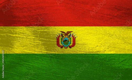 Colors of Bolivia's flag wave gracefully in the warm sunlight
