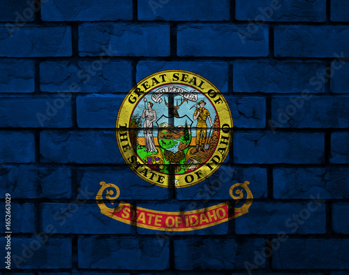 Symbol of pride shown on a brick wall in vibrant colors