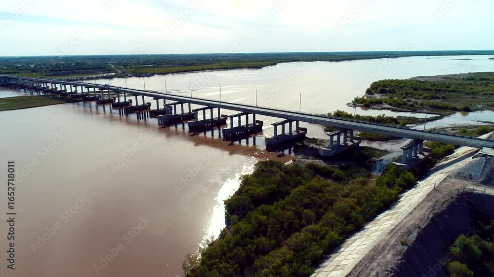 custom made wallpaper toronto digitalA stunning aerial view of a picturesque river bridge, beautifully surrounded by a lush landscape