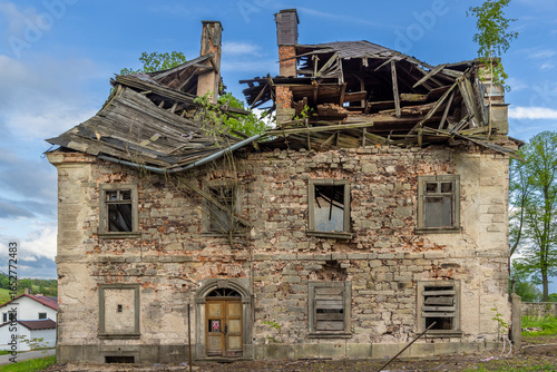 Ruined house with collapsed roof in Sonov, Czechia