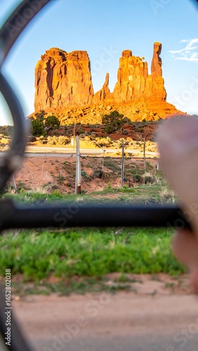 Desert butte viewed through fence