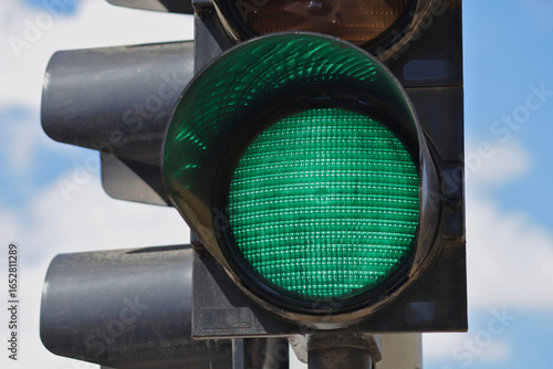 Close-op of a green LED traffic light.