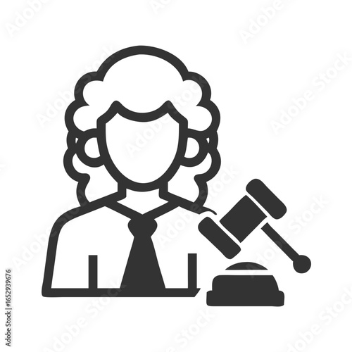 Judge sitting at the bench with gavel in courtroom  